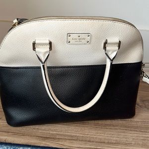 Gently used black and white Kate Spade handbag